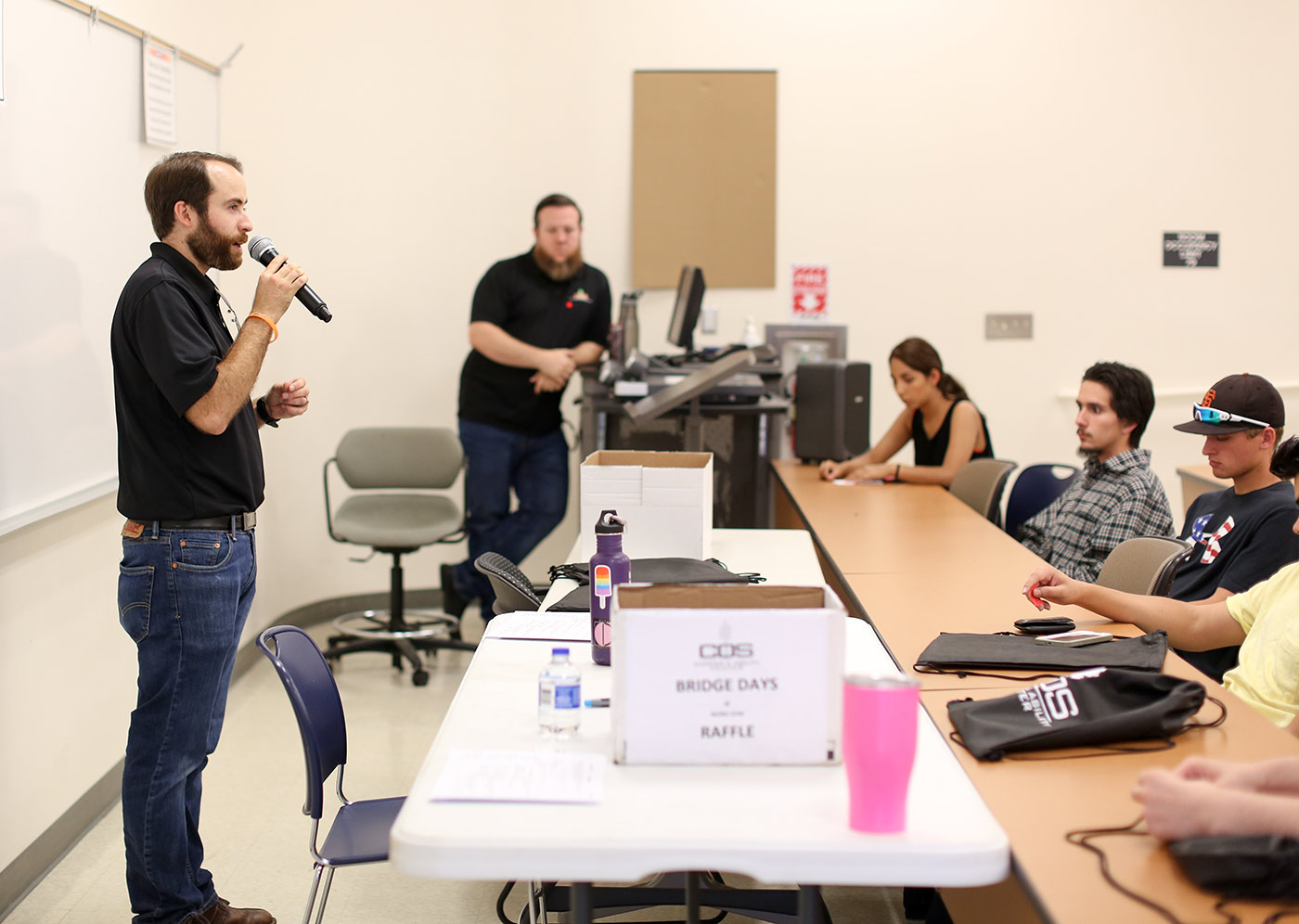 AAC staff presenting to a classroom