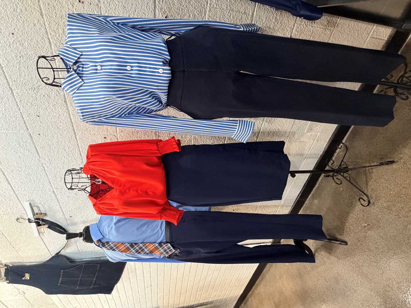 a group of clothes on swingers