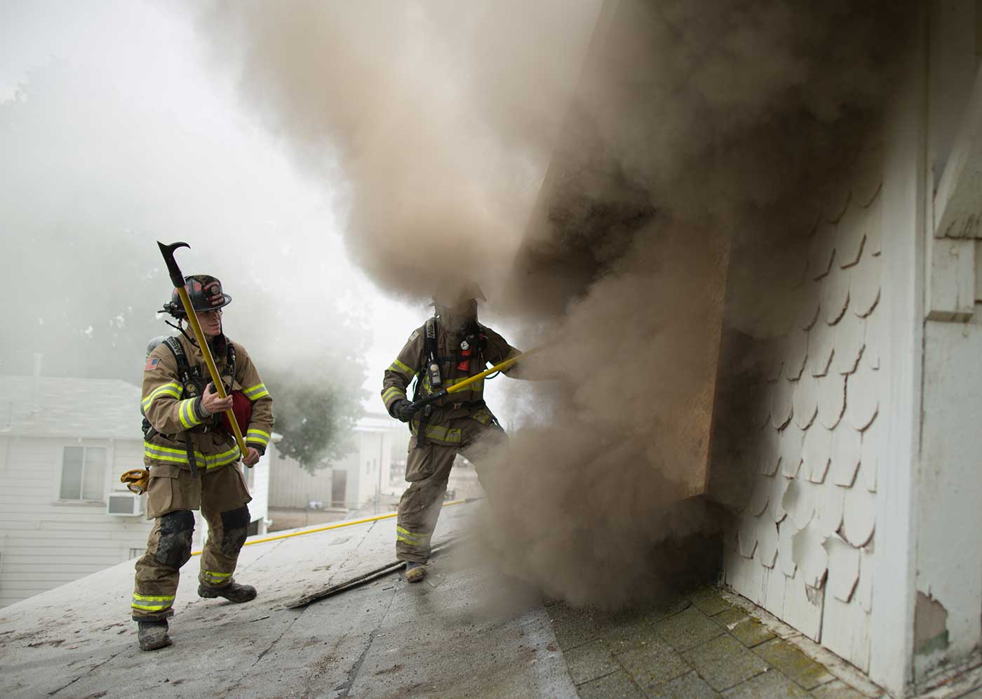 a few firefighters putting out a fire