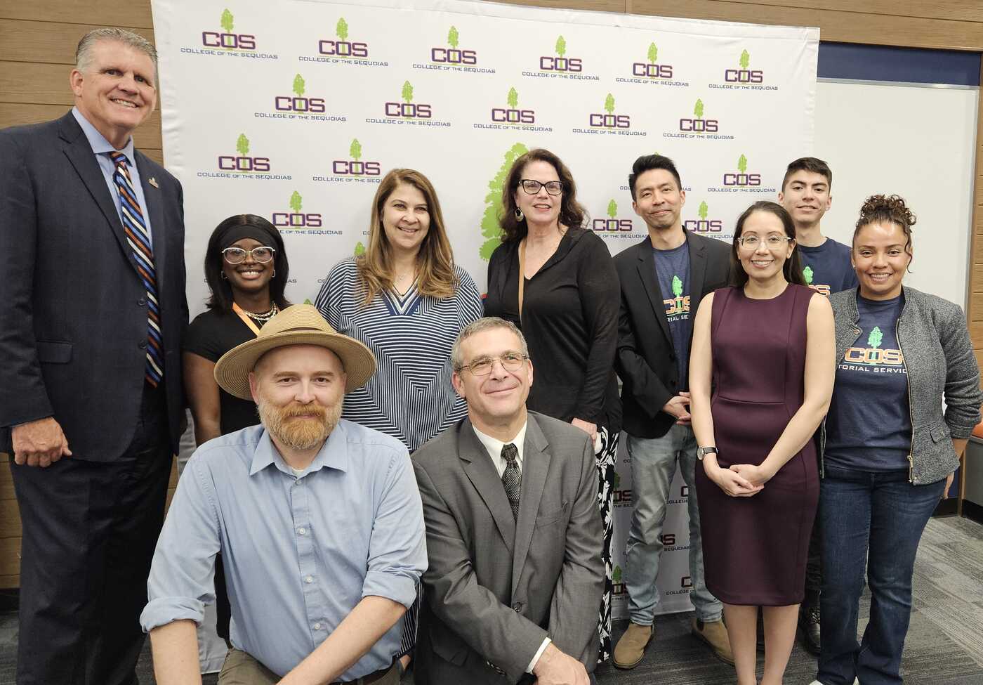 a group of people posing for a photo