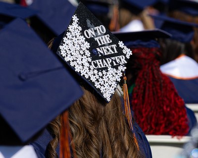 a group of people wearing graduation caps