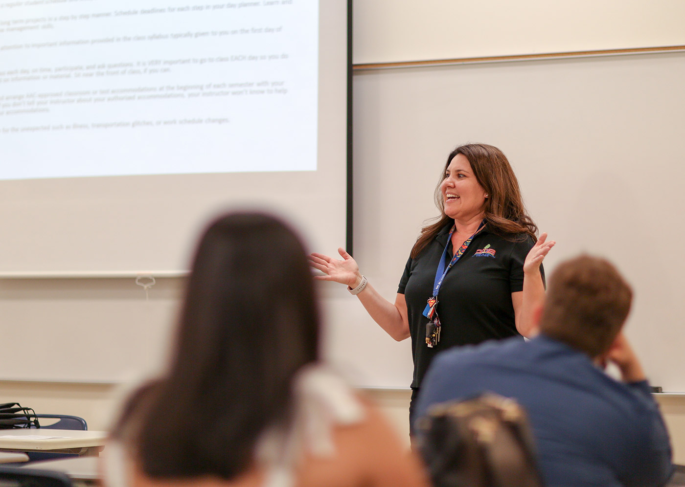 AAC staff presenting to a classroom